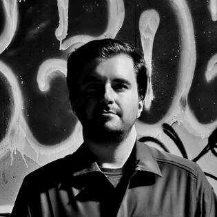 Ben Sabic Photograph of Ben taken in an alleyway at night